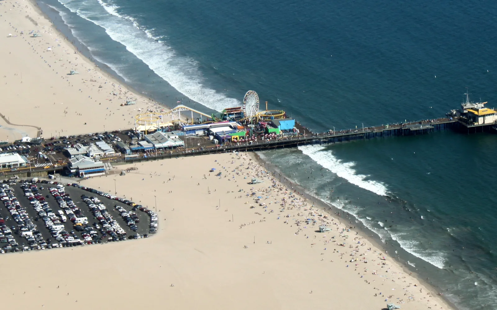 Aerial view of the Santa Monica Pier extending into the Pacific Ocean